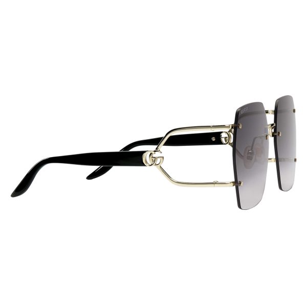 Gucci Geometric Frame Sunglasses at Enigma Boutique
